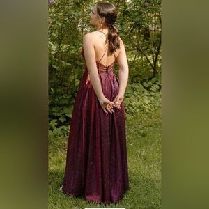 Last years prom dress from Macy’s, it’s a fuchsia sparkly color, with pockets!